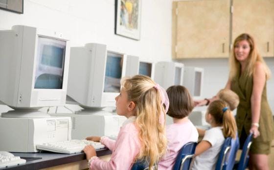 Children on computers at school